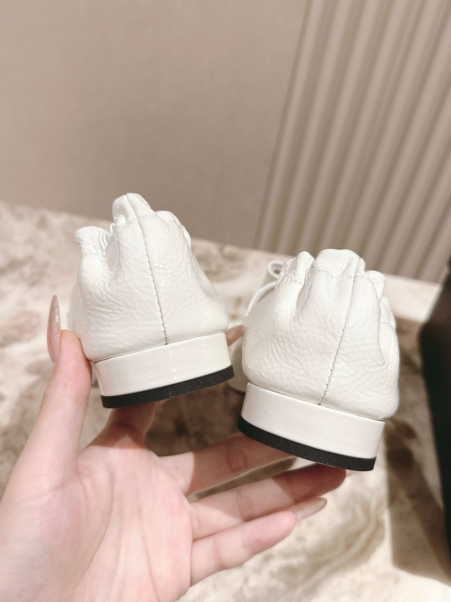 CC FLATS 25S IN WHITE PATENT LEATHER