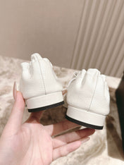 CC FLATS 25S IN WHITE PATENT LEATHER