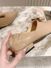 CC FLATS 25S IN BEIGE PATENT LEATHER