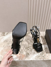 YSL 25S STILETTO HIGH-HEEL SANDALS 100 MM IN BLACK LAMBSKIN WITH GOLD HARDWARE