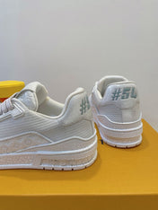 LV TRAINER MAXI SNEAKER IN WHITE EMBOSSED CALFSKIN