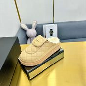 THICK-SOLED SLIDE IN LIGHT YELLOW LAMBSKIN AND WOOL LINING