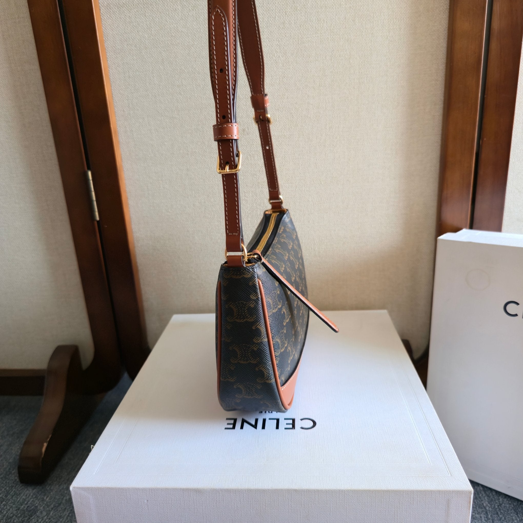 CELINE 25S SHOULDER BAG 21MM IN BLACK TRIOMPHE CANVAS AND BORWN CALFSKIN