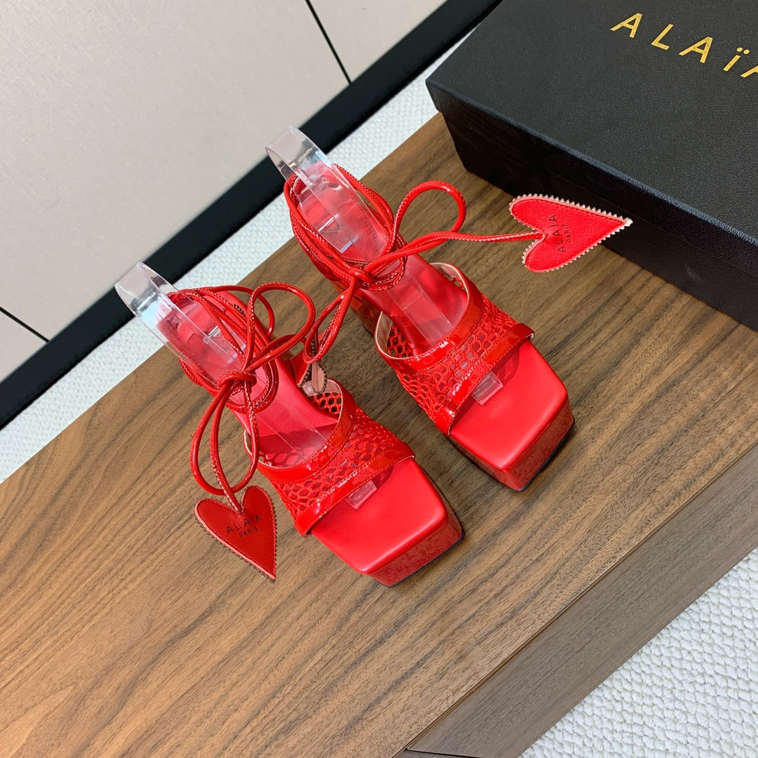 ALAIA BANQUET WEDGE SANDALS IN CHERRY RED LAMBSKIN WITH RED HEART