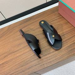 FLAT SLIPPERS IN BLACK CALFSKIN