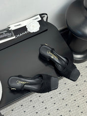 CC HIGH HEELS IN BLACK QUILTED SUEDE