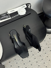 CC HIGH HEELS IN BLACK QUILTED SUEDE