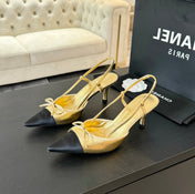 SLINGBACK WITH BOW IN GOLDEN MIX BLACK LAMBSKIN