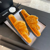 SLIPPERS IN SAFETY ORANGE FUR