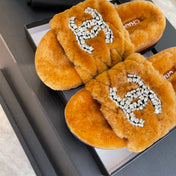 SLIPPERS IN SAFETY ORANGE FUR