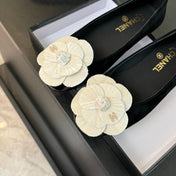 BALLET FLATS IN BLACK SUEDE WITH WHITE CAMELLIA