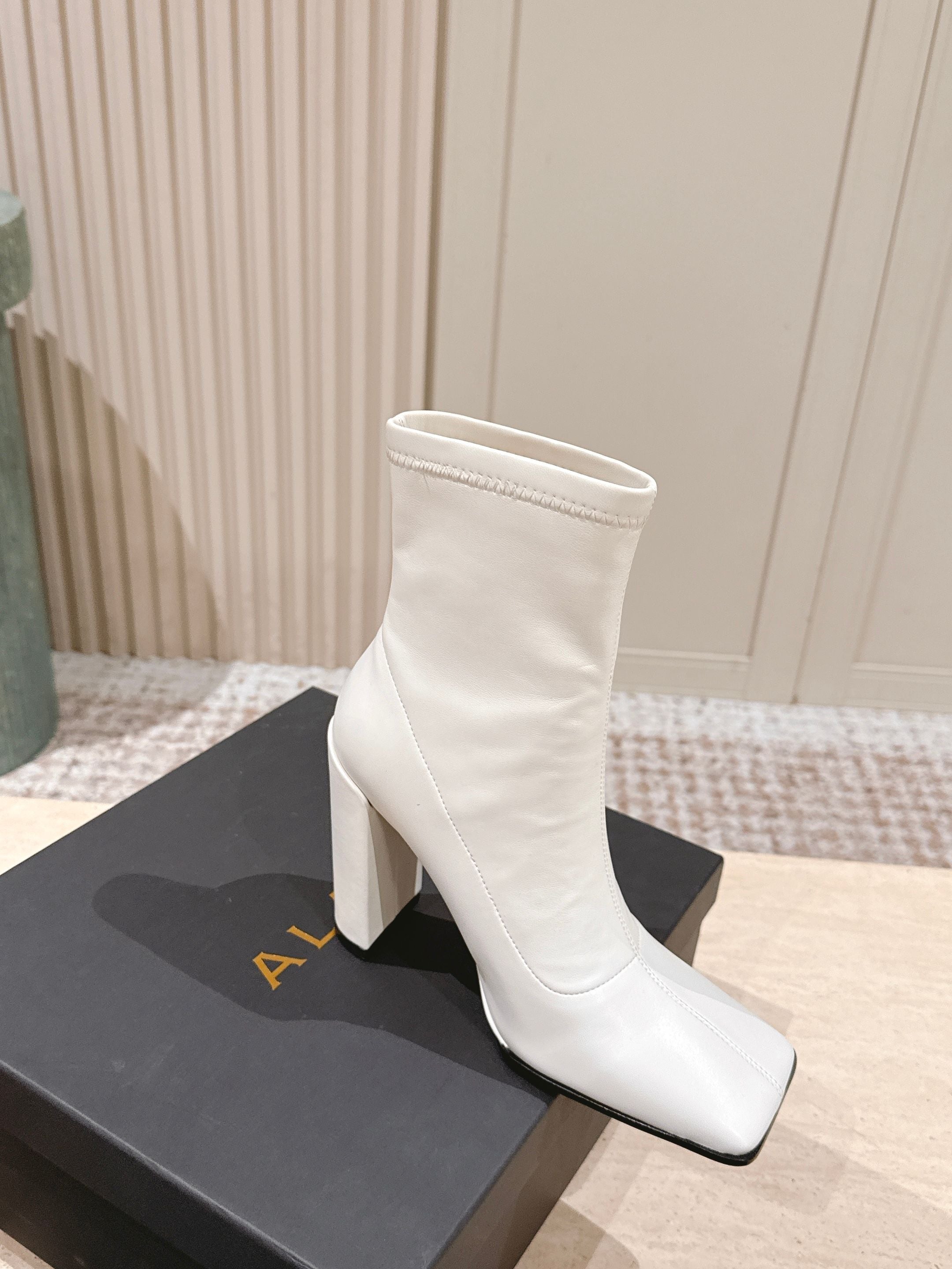 ALAIA 26S HEELED BOOTS 90 MM IN WHITE CALFSKIN