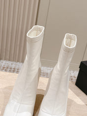 ALAIA 26S HEELED BOOTS 90 MM IN WHITE CALFSKIN