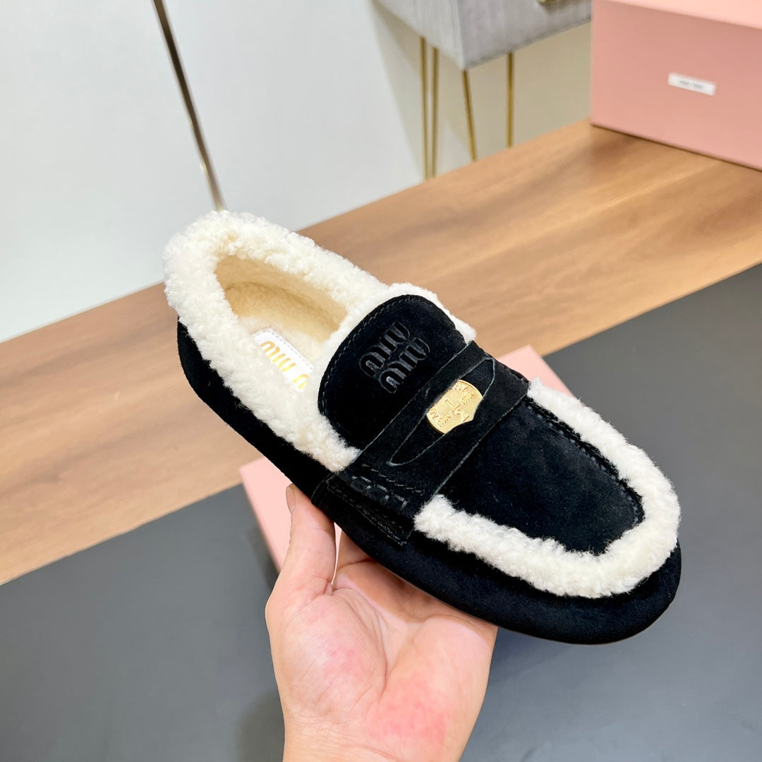 LOAFERS IN BLACK SUEDE AND WHITE SHEARLING TRIM