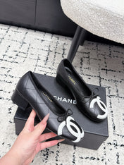 CHANEL 26S HIGH HEELS IN BLACK LAMBSKIN WITH BOW