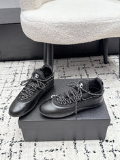 CHANEL 26S LACE-UP SNEAKERS IN BLACK FABRIC AND LAMBSKIN