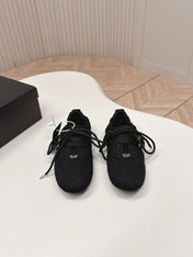 PRADA 26S LACE UP MINIMAL SNEAKERS IN BLACK CANVAS
