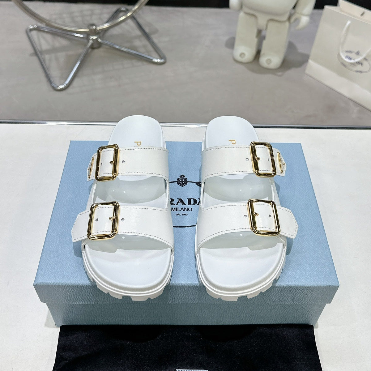 PRADA 25S STRAP SLIDES 30MM IN WHITE CALFSKIN GOLD HARDWARE