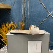 FLAT MULE IN WHITE CREAM CALFSKIN