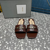 FLAT MULE IN SYRUP BROWN CALFSKIN