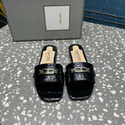 FLAT MULE IN BLACK CALFSKIN