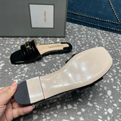 FLAT MULE IN BLACK CALFSKIN