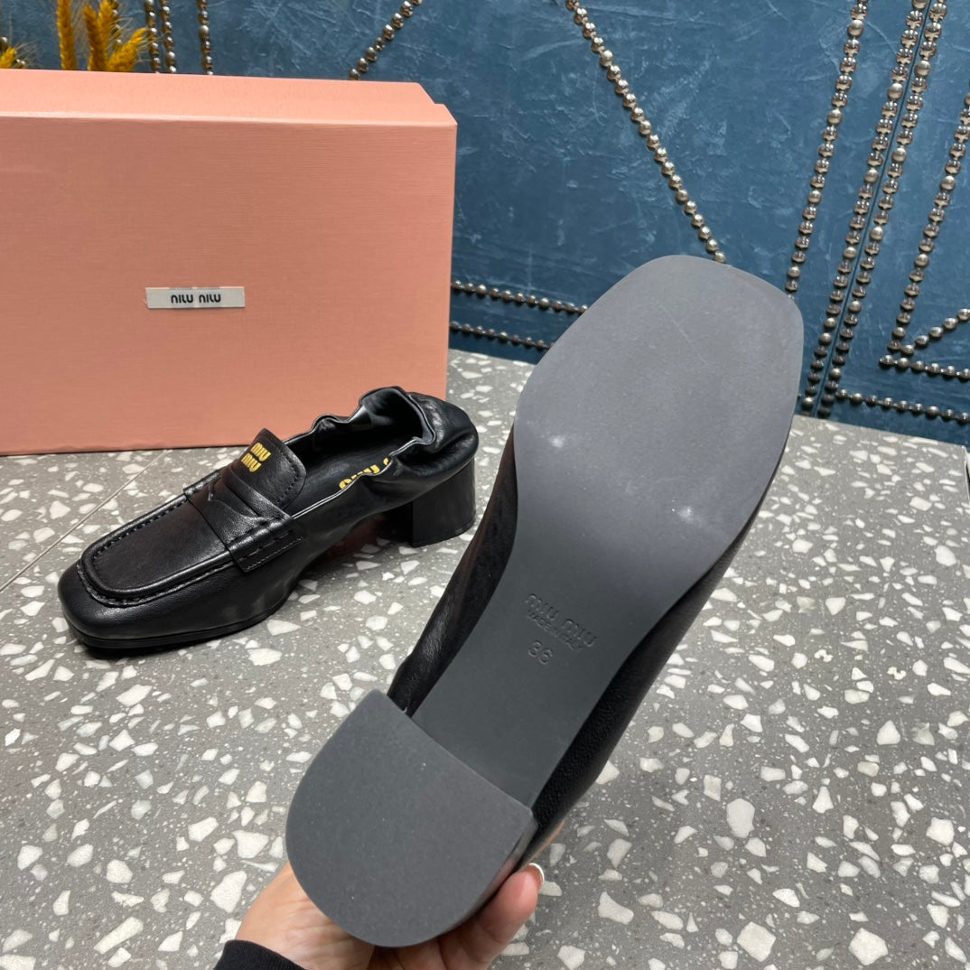 HIGH BROGUE LOAFERS IN BLACK LAMBSKIN