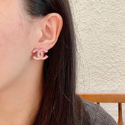 DOUBLE C STUD EARRINGS WITH PINK TRIM AND CENTER STONE