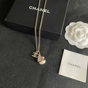 CHANEL 26S DOUBLE C LOGO SAILBOAT PENDANT NECKLACE WITH PEARL IN GOLD METAL 630060