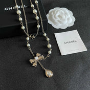 CHANEL 26S DOUBLE C LOGO PEARL LAYERED CHAIN BOW & CRYSTAL DROP NECKLACE IN GOLD METAL 629883