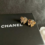CHANEL 26S FOUR PETAL FLOWER STUD EARRINGS IN GOLD METAL 631031