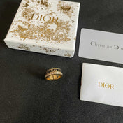 CD 26S CRYSTAL BAND LOGO RING IN GOLD TONE METAL 630811