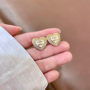 CHANEL 26S DOUBLE C LOGO PAVE HEART STUD EARRINGS WITH WHITE ENAMEL IN GOLD METAL 631815