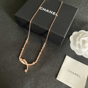 CHANEL 26S CRYSTAL STAR CHARM NECKLACE IN ROSE GOLD METAL 631898
