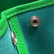 GARDEN PARTY 30CM IN CADMIUM GREEN TOILETS COTTON CANVAS AND GREEN CALFSKIN