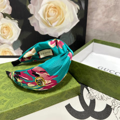 HAIRBAND IN TURQUOISE GREEN FLORAL SILK 252676