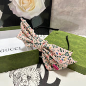 HAIRBAND IN LIGHT PINK FLORAL FABRIC 385853