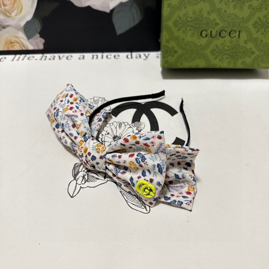 HAIRBAND IN WHITE FLORAL FABRIC 385855