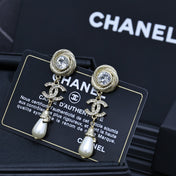 25S TWISTED RIBBED DOUBLE C IN GOLD METAL LONG PEARL PENDANT EARRINGS