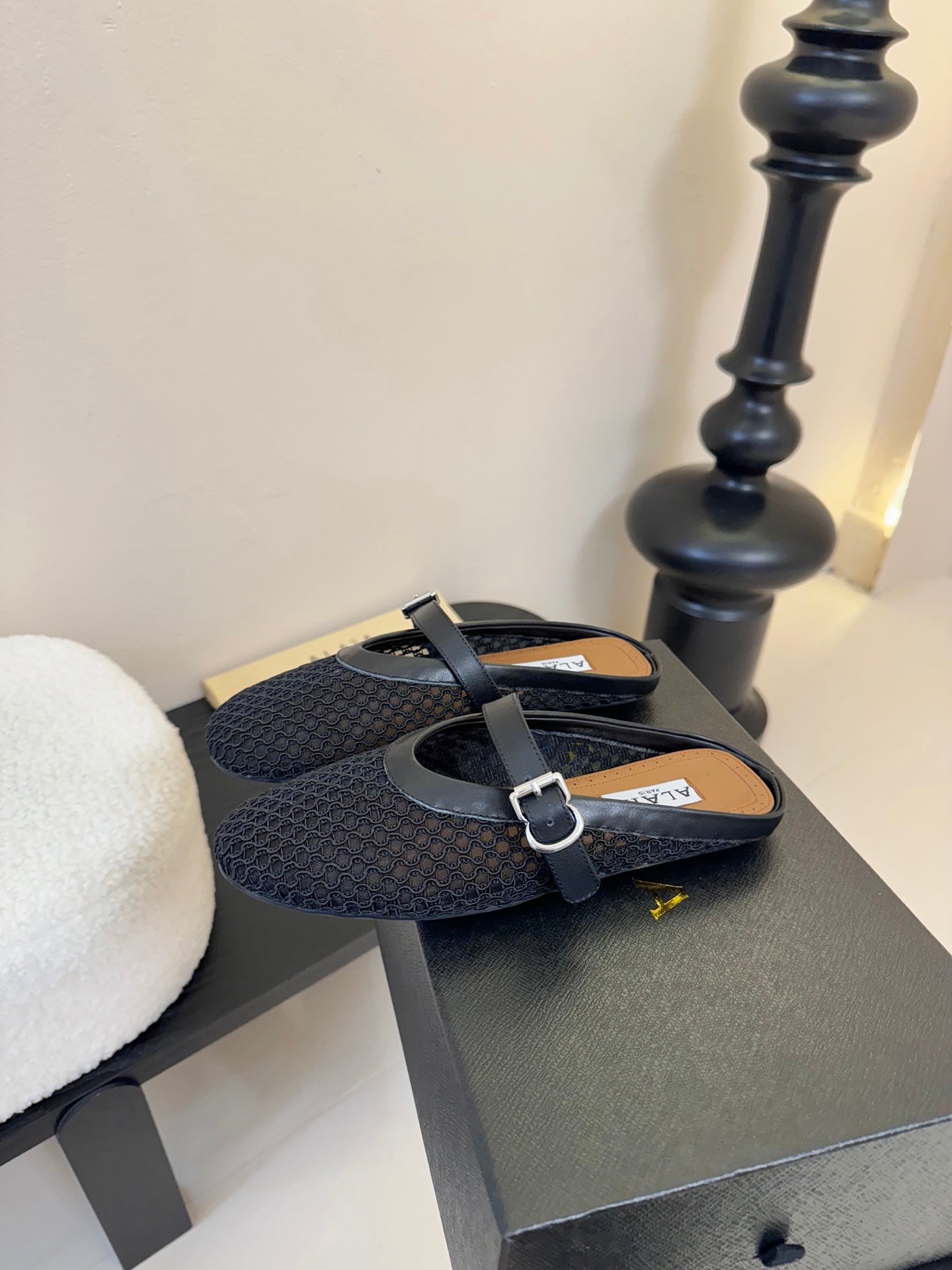 ALAIA FLAT MULES 25S IN BLACK WOVEN MESH