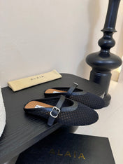 ALAIA FLAT MULES 25S IN BLACK WOVEN MESH