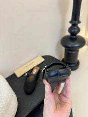 ALAIA FLAT MULES 25S IN BLACK WOVEN MESH