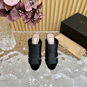 ALAIA ELASTIC CAGE MULE SANDALS IN BLACK WOVEN STRAP AND LAMBSKIN