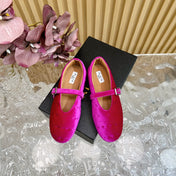 ALAIA BALLET FLATS IN DEEP PINK VELVET