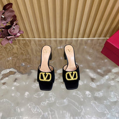 VALENTINO 25S HIGH-HEEL MULES 60 MM IN BLACK VELVET AND CALFSKIN WITH GOLD HARDWARE