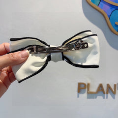 BOW HAIRPIN IN WHITE AND BLACK TRIM COTTON 406023