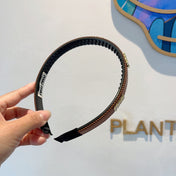 HEAD BAND IN BURNT ORANGE LAMBSKIN AND RESIN 417296