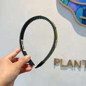 HEAD BAND IN OLIVE GREEN LAMBSKIN AND RESIN 417298