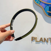 HEAD BAND IN OLIVE GREEN LAMBSKIN AND RESIN 417298