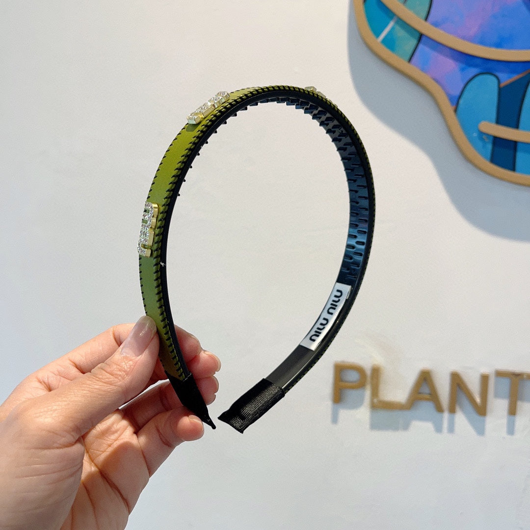 HEAD BAND IN OLIVE GREEN LAMBSKIN AND RESIN 417298